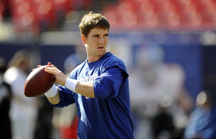 Eli Manning warms up during practice in preparation for the Giants week 9 game versus the Eagles. 