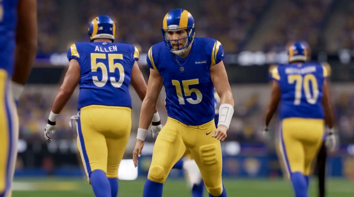 Los Angeles Rams quarterback George Johnson celebrates another touchdown in the end zone.